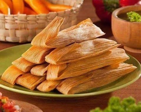 A family-style plate of traditional tamales