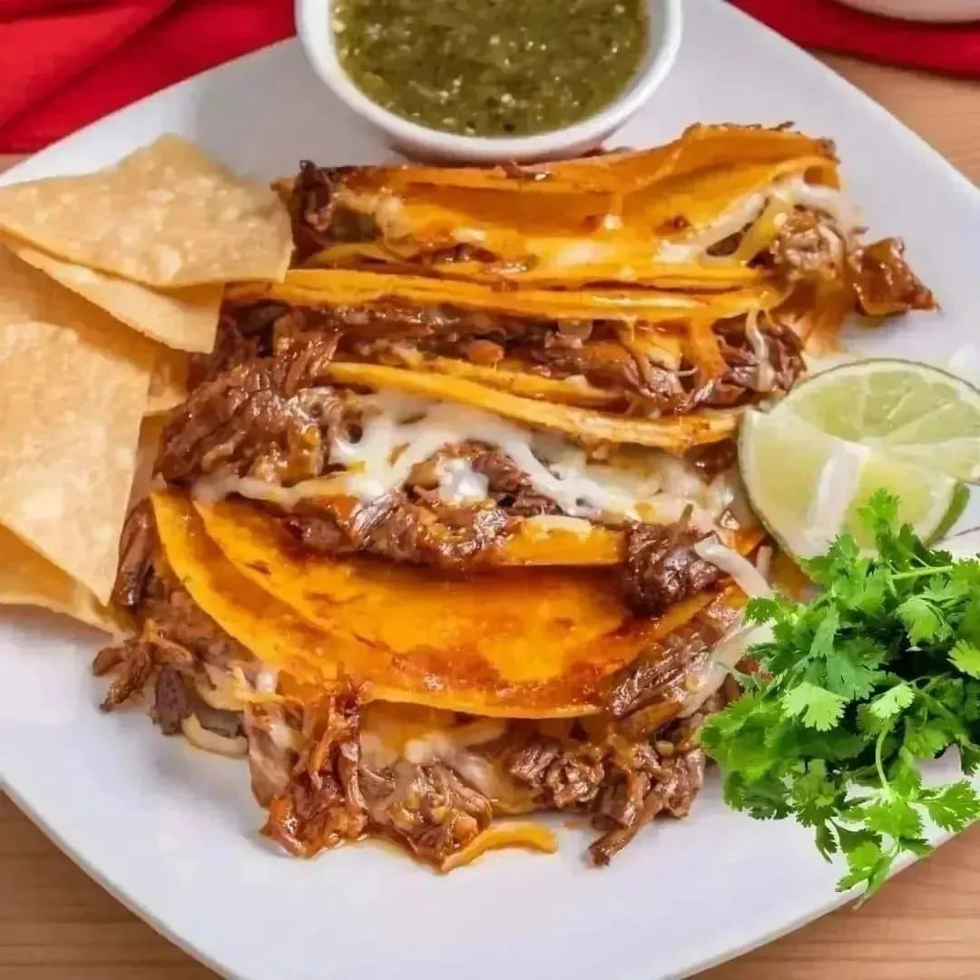 Crispy birria tacos served at Fiesta Market & Restaurant