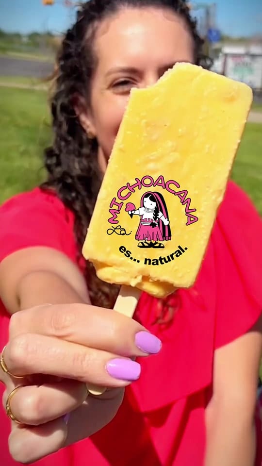A La Michoacana mango paleta enjoyed outdoors in Calgary